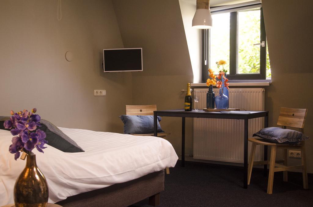 Hotel Jambon Uden Esterno foto